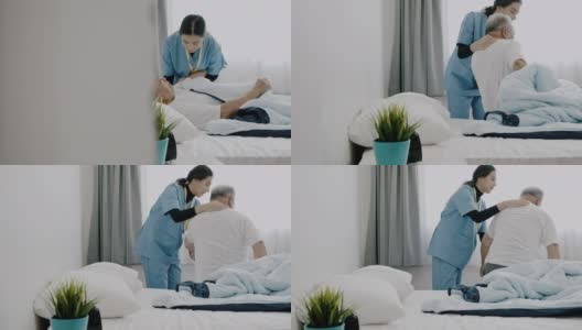 图为护士帮助老人起床。高清在线视频素材下载
