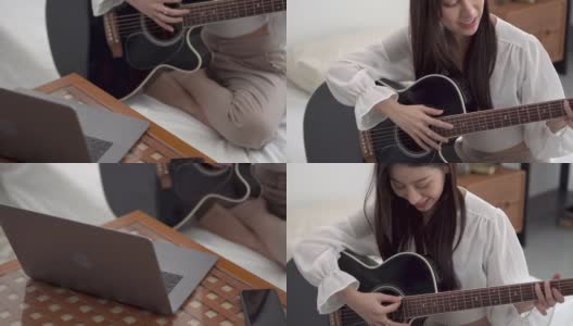 女子学习吉他课程在线。高清在线视频素材下载