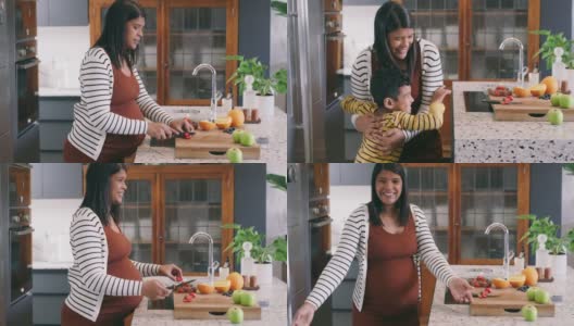 一段母亲和儿子在家里厨房准备零食时的亲密关系的4k视频高清在线视频素材下载