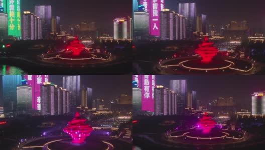 青岛市夜间时间市中心灯火辉煌的海湾著名纪念碑广场航拍全景4k中国高清在线视频素材下载