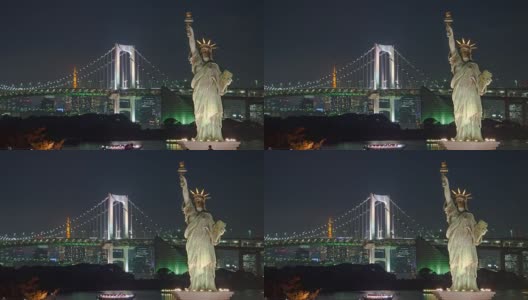 平移:台场的自由女神像和彩虹桥的夜晚高清在线视频素材下载