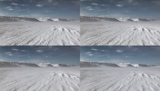 越野车在北极斯匹次卑尔根斯瓦尔巴特群岛北极。高清在线视频素材下载