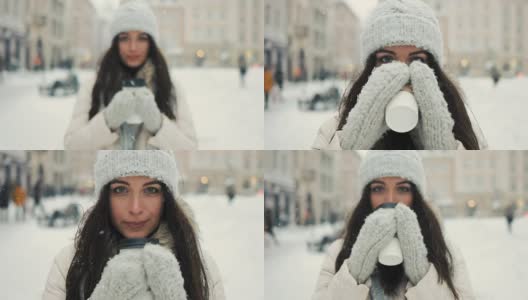 快乐，寒假，圣诞节，饮料和人的概念-微笑的年轻女子在白色温暖的衣服和喝咖啡带走了雪城的背景高清在线视频素材下载