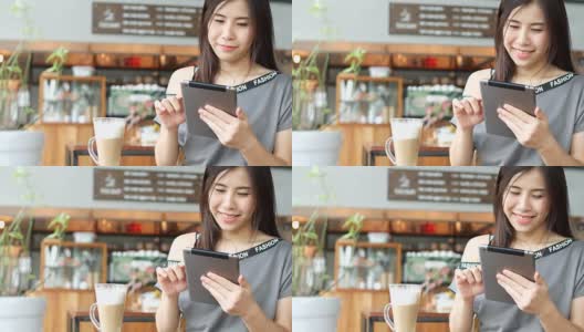 女性在咖啡馆使用平板电脑高清在线视频素材下载
