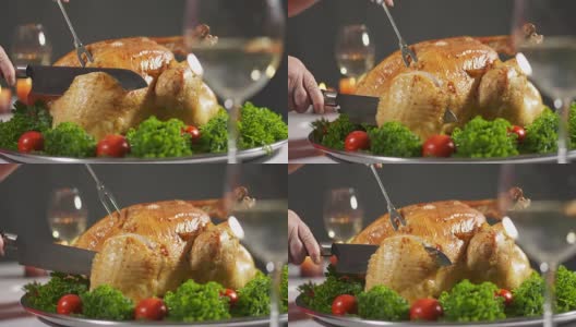 感恩节或圣诞节的火鸡大餐。切火鸡切多汁的肉高清在线视频素材下载