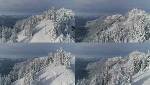 徒步旅行路线在新鲜的边远地区粉末雪在山顶空中高清在线视频素材下载