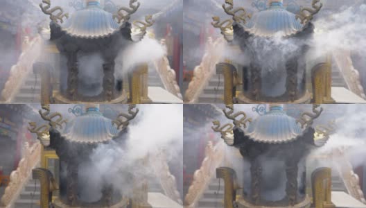 中国青海省西宁市南山寺的烟雾和香炉。高清在线视频素材下载