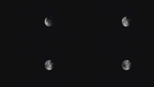 满月与云在暴风雨夜的云通过月亮的细节是可见的在月球表面在一个黑暗的多云的夜晚高清在线视频素材下载
