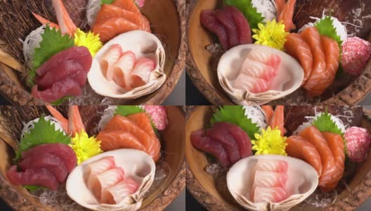 日本料理生鱼片把正餐放在转盘上。高清在线视频素材下载