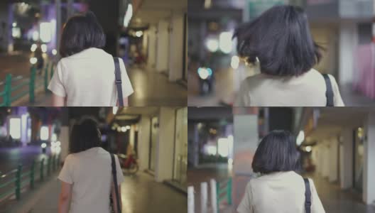 亚洲女人走在城市里高清在线视频素材下载
