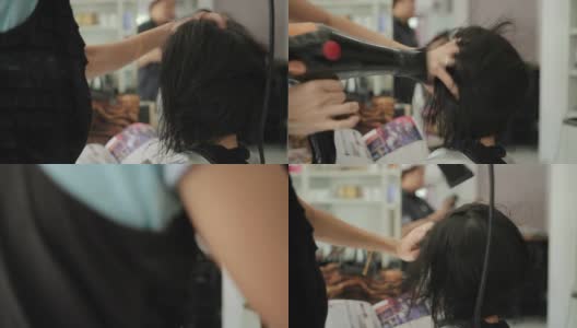 亚洲妇女在美容院理发后正在烘干头发高清在线视频素材下载