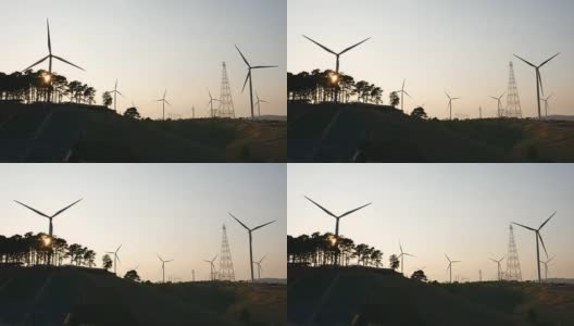剪影风力涡轮机在日落，可再生能源高清在线视频素材下载