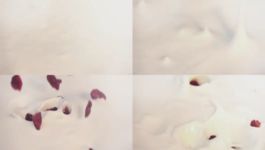 三段蔓越莓落入酸奶的慢动作视频高清在线视频素材下载