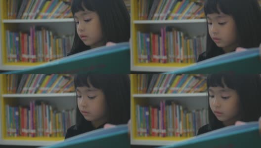 亚洲女孩在图书馆看书高清在线视频素材下载