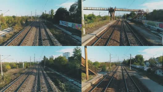 动态第一人称视角拍摄的无人机飞过铁路轨道和通过铁桥下高清在线视频素材下载