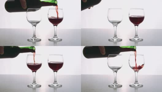 两个水晶酒杯在餐厅酒吧里盛满了浓郁的干红葡萄酒高清在线视频素材下载