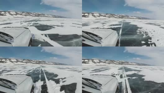 从车里看。汽车在冰上行驶。美丽的景色从汽车挡风玻璃到冬天的风景冻结贝加尔湖。高清在线视频素材下载