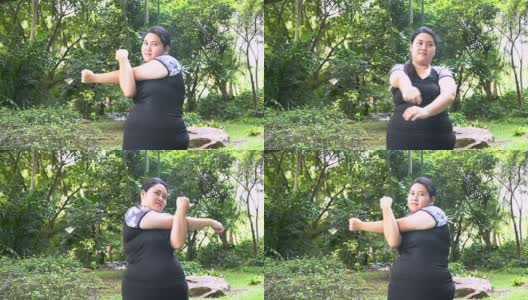 超重的亚洲妇女在公园练习运动高清在线视频素材下载