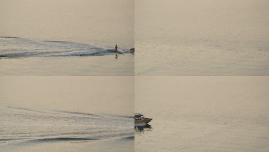 夕阳下海面上滑水高清在线视频素材下载