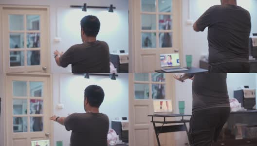 后视图亚洲男人在家里做有氧舞蹈锻炼减肥和身体调理高清在线视频素材下载