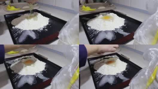 把生鸡蛋加到面粉里，做成一个简单的面团高清在线视频素材下载