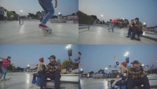亚洲朋友一起在公园玩滑板。高清在线视频素材下载