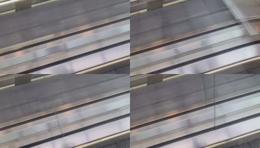 在透视图中，自动扶梯的空台阶的特写。高清在线视频素材下载