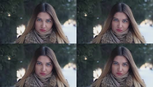 一个美丽女孩的肖像，背景是冬天的野猪高清在线视频素材下载