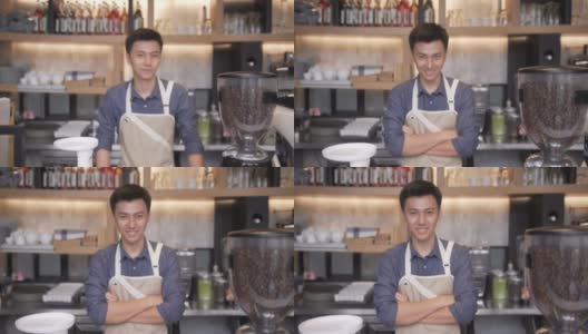 特写和焦点正面:年轻的亚洲咖啡师正在微笑着成为咖啡店的老板高清在线视频素材下载