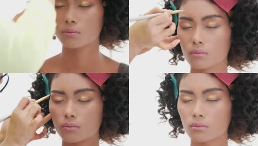 化妆师为黑人女性化妆高清在线视频素材下载