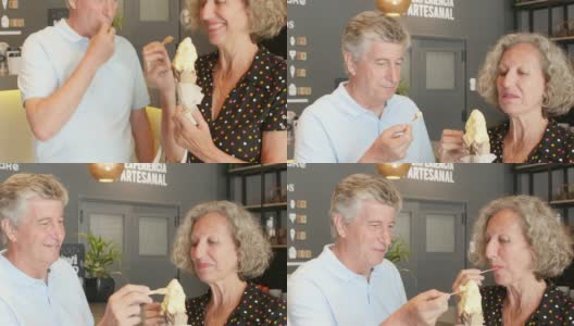 快乐的老年情侣在约会一边聊天一边分享冰淇淋高清在线视频素材下载