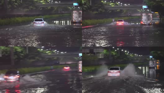 汽车被暴雨淹没了公路。高清在线视频素材下载