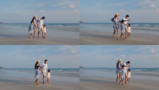 亚洲家庭愉快的散步，放松和休息在海滩夏季一起度假。家庭、旅游、暑期度假的概念。4 k决议。高清在线视频素材下载