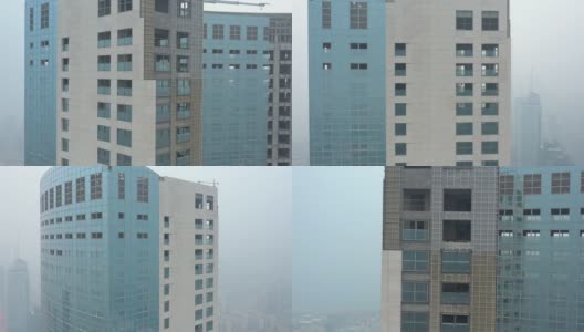 青岛市区白天雾霾市区废弃摩天大楼空中全景4k中国高清在线视频素材下载