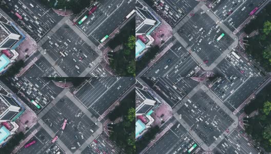 T/L PAN无人机视角的城市街道十字路口在白天高清在线视频素材下载