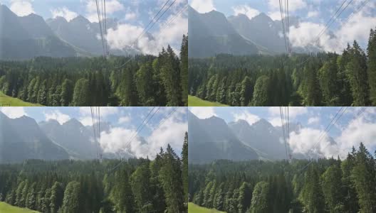 在德国阿尔卑斯山脉上乘坐缆车高清在线视频素材下载