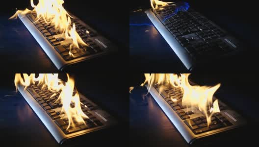 电脑键盘在慢镜头中闪烁着火舌高清在线视频素材下载