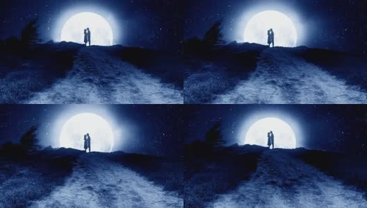在月亮背景下的夜晚，在山上拥抱的夫妇。高清在线视频素材下载