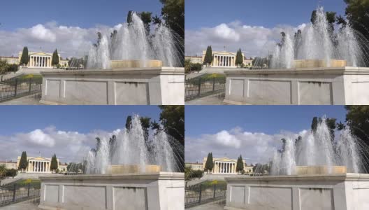 位于雅典的古典建筑Zappeion背景中的喷泉高清在线视频素材下载