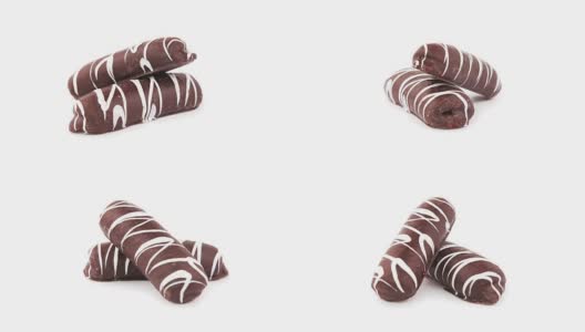 黑巧克力香酥饼覆盖360度，打开白色背景。循环视频高清在线视频素材下载