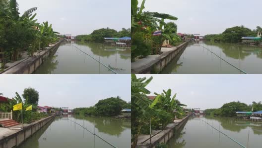 村庄，沿运河鸟瞰泰国民居风格。高清在线视频素材下载
