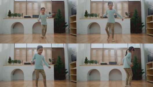 小女孩在客厅跳舞的全程镜头高清在线视频素材下载
