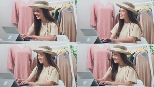 一名亚洲女性在网上销售复古服装，她在社交媒体上直播。高清在线视频素材下载