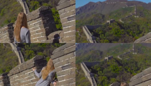 一个年轻的女人透过中国长城的开口处。这座墙在山的一侧开始倒塌高清在线视频素材下载