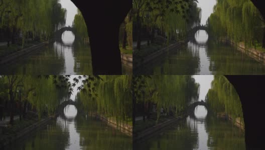 阳光明媚的一天时间杭州城著名的湖河步行桥慢镜头全景4k中国高清在线视频素材下载