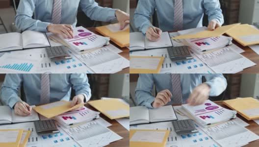 人把装有笔记本的信封放在工作桌上高清在线视频素材下载