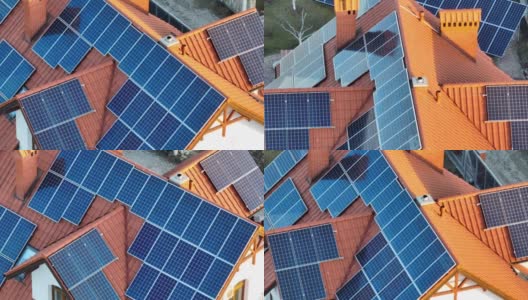 鸟瞰图建筑屋顶与一排排蓝色太阳能光伏板产生清洁的生态电能。零排放的可再生电力高清在线视频素材下载