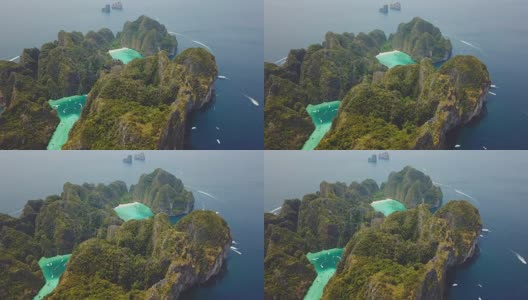 无人机拍摄的热带玛雅湾和石灰岩悬崖，皮皮岛，泰国高清在线视频素材下载
