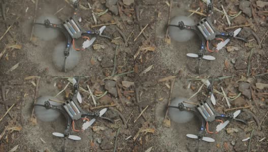 Quadrocopter。破碎的四轴飞行器躺在地上高清在线视频素材下载