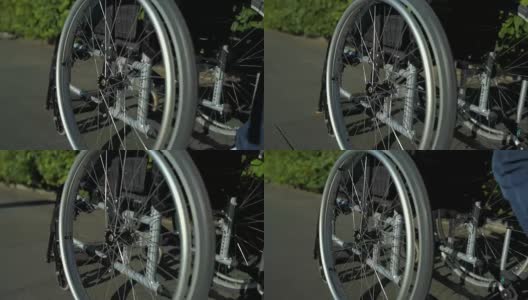 追踪公园里的一辆轮椅高清在线视频素材下载